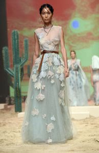 A model walks the runway during the Amato show at Fashion Forward Spring/Summer 2017 held at the Dubai Design District on October 23, 2016 in Dubai, United Arab Emirates.